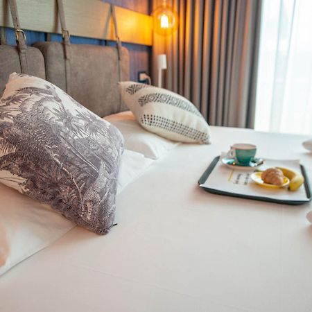 Glocal Torbole Hotel Torbole Sul Garda Bagian luar foto